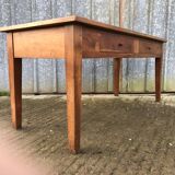 Antique solid cherry farmhouse table with 2 front drawers.