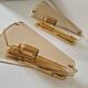 Pair of wall lights in brass and smoked glass by Lakro Amstelveen.