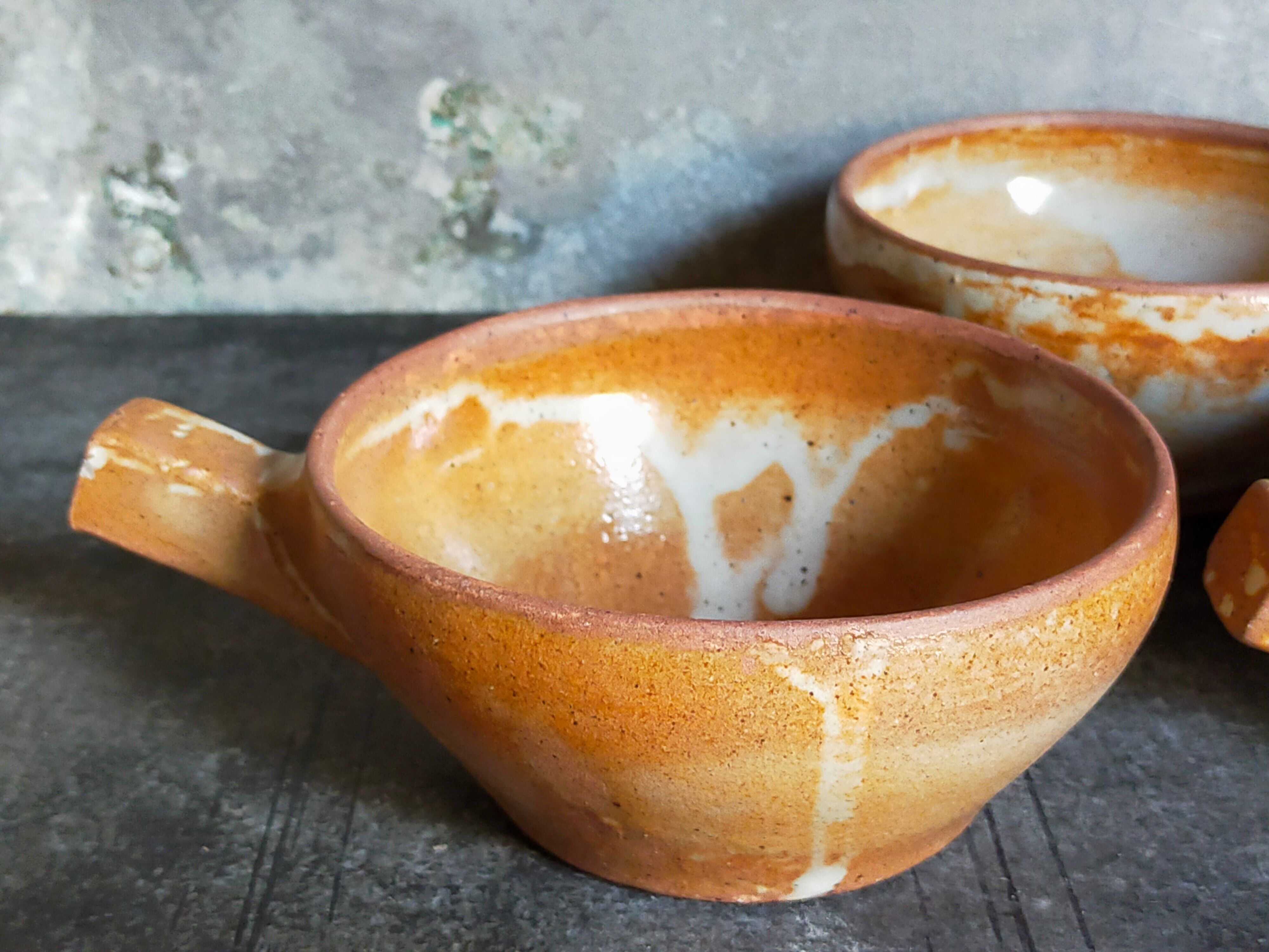 Three vintage marais sandstone bowls