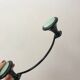 Design coat hook in sage green and black metal from the 70s
