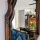Large wooden wall mirror - wavy carving and natural patina