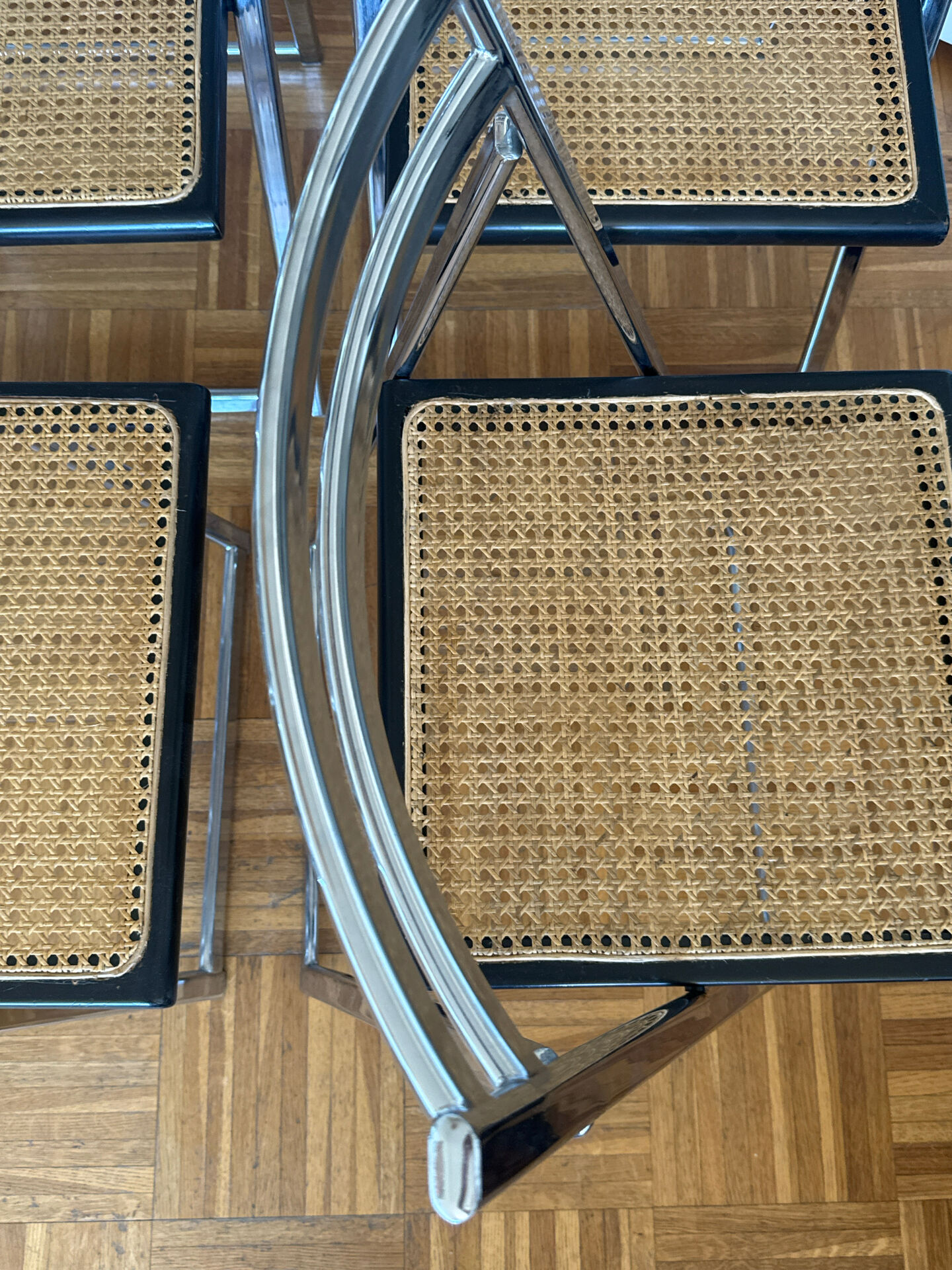Set of 4 Italian folding chairs with caning.
