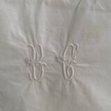 White cotton pillowcase with monogram BC.