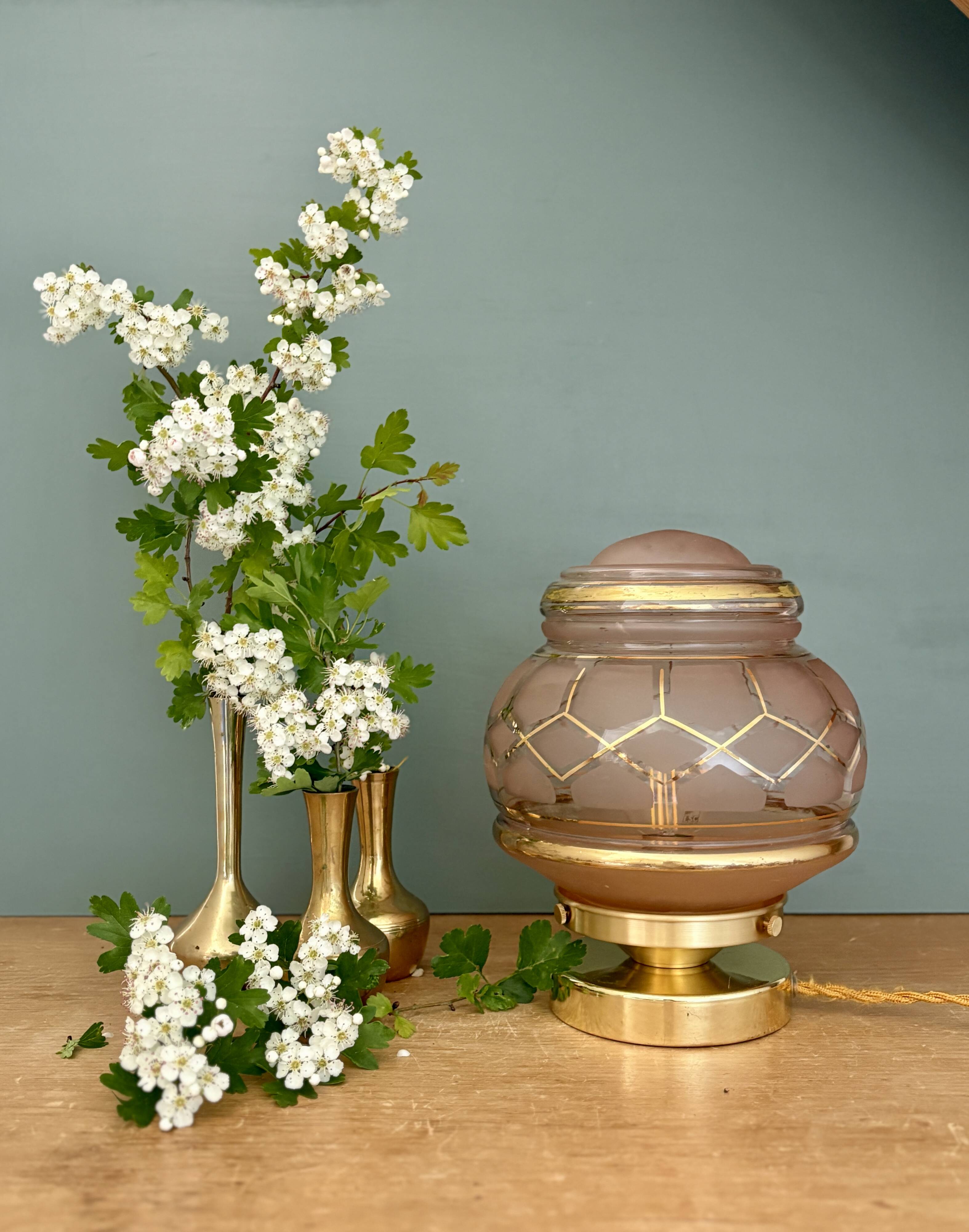 Vintage Art Deco globe table lamp in pink and gold glass.