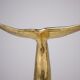 Solid brass dolphin console feet.