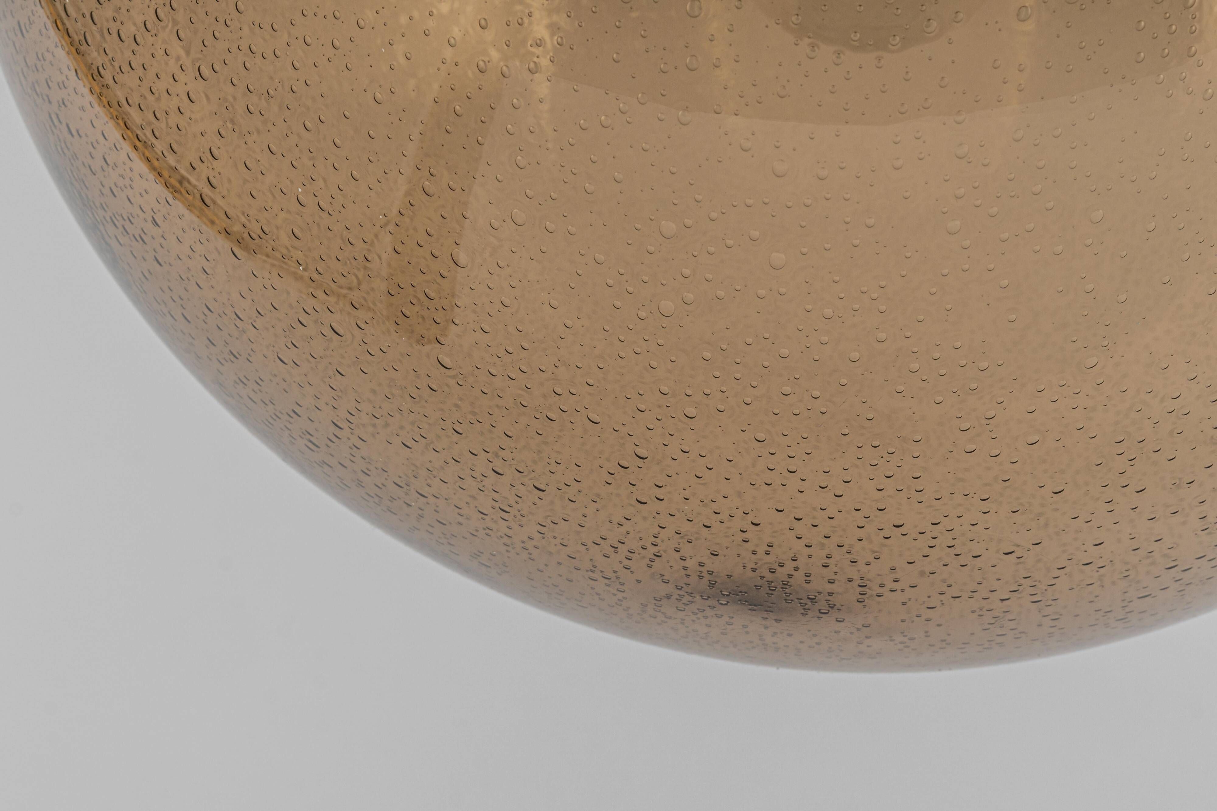 Large smoked glass ball pendant by Limburg with brass, Germany, 1970s.