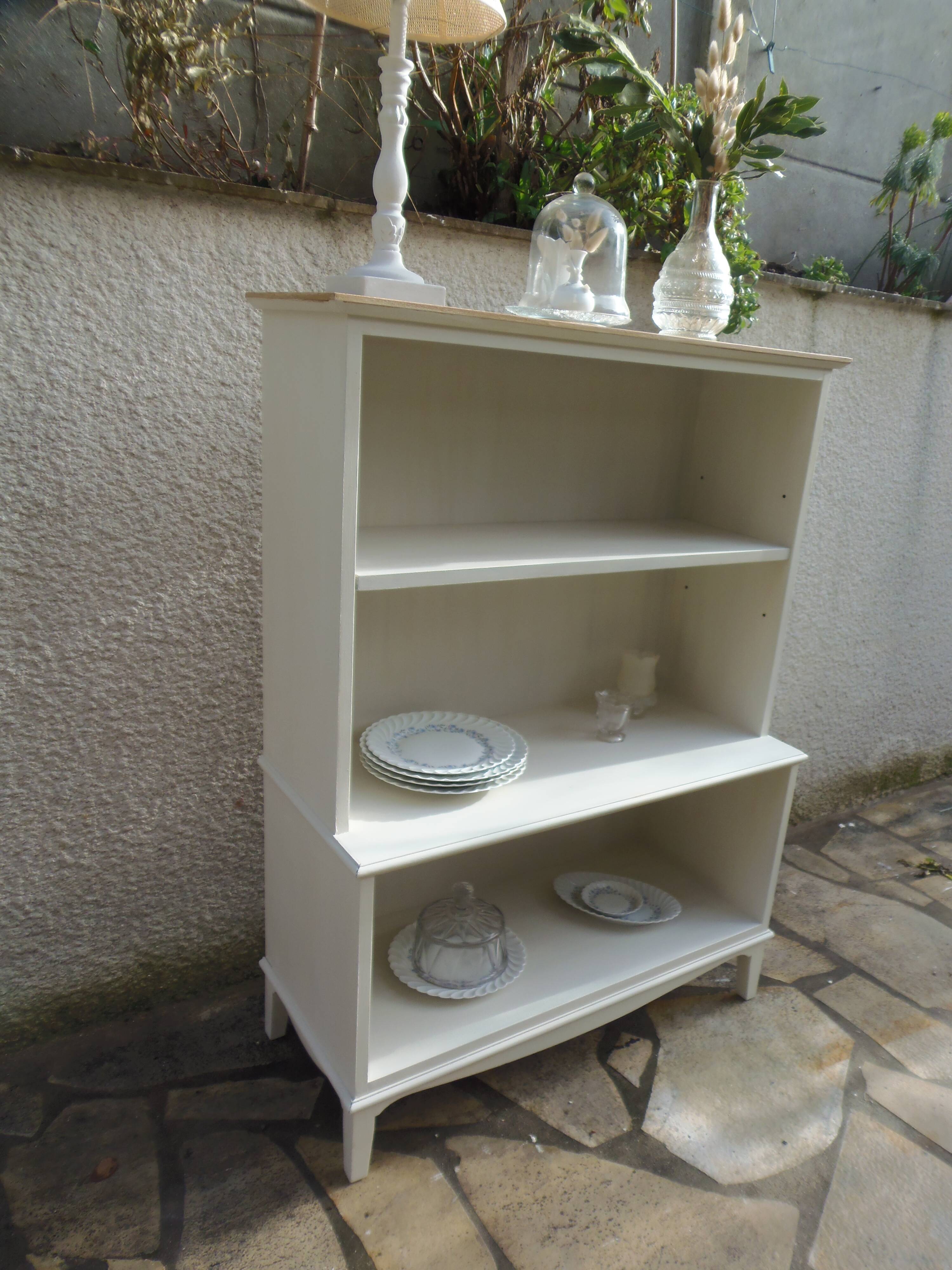 Vintage library enhanced in beige, wooden top.