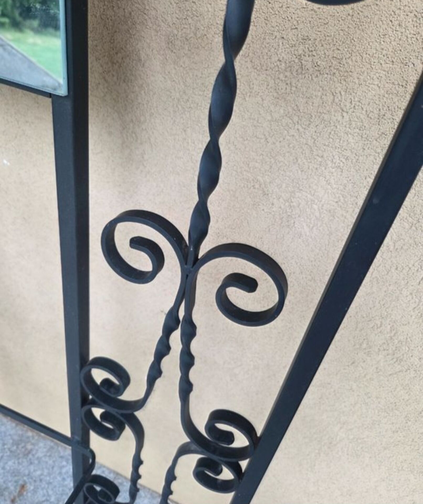 Large vintage wall coat rack in wrought iron with mirror and shelf.