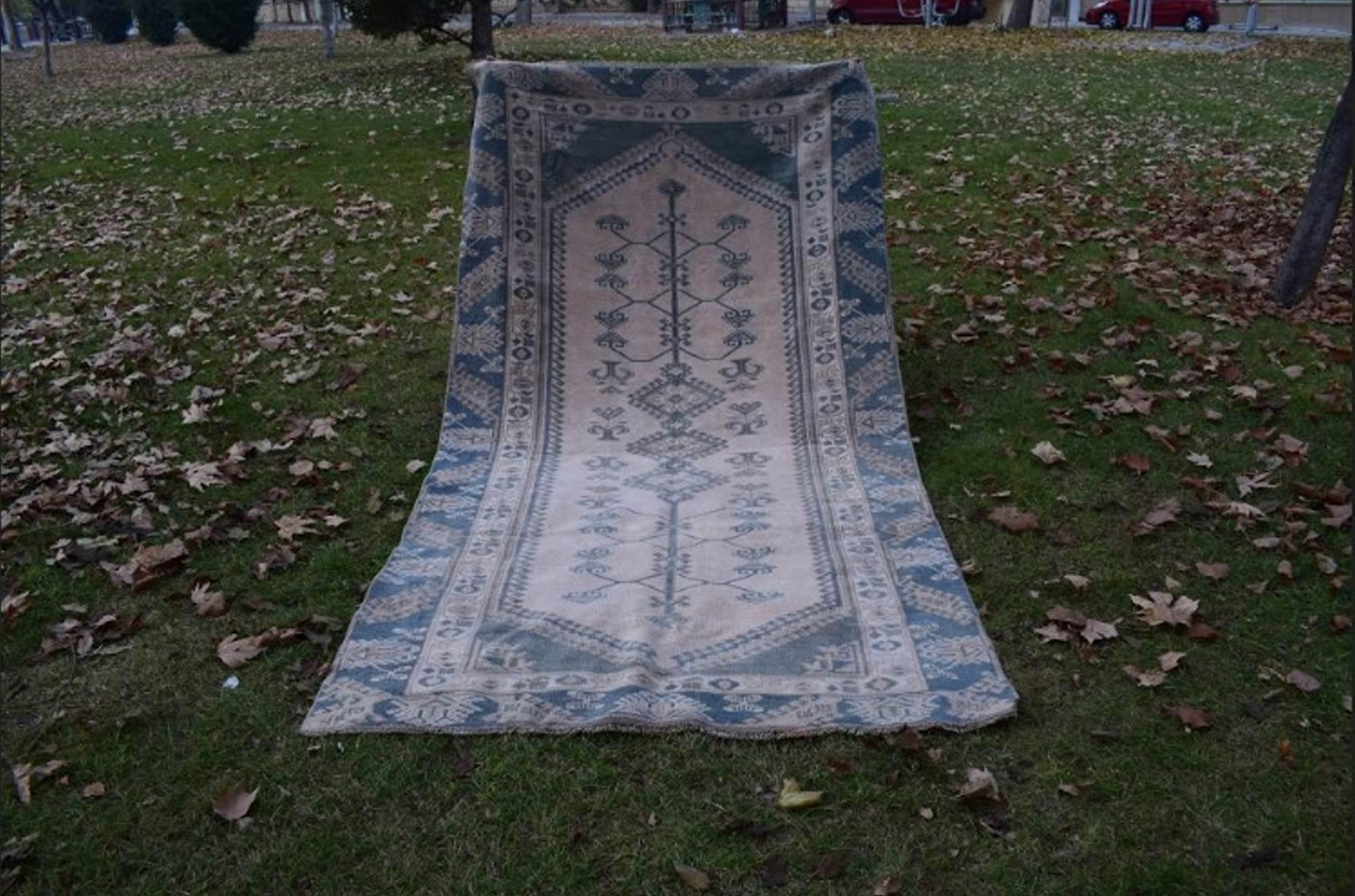 Vintage distressed Turkish Oushak rug 150 x 275 cm
