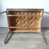 Ottoman foot rest in chrome and black leatherette of the 1950s