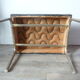 Ottoman foot rest in chrome and black leatherette of the 1950s