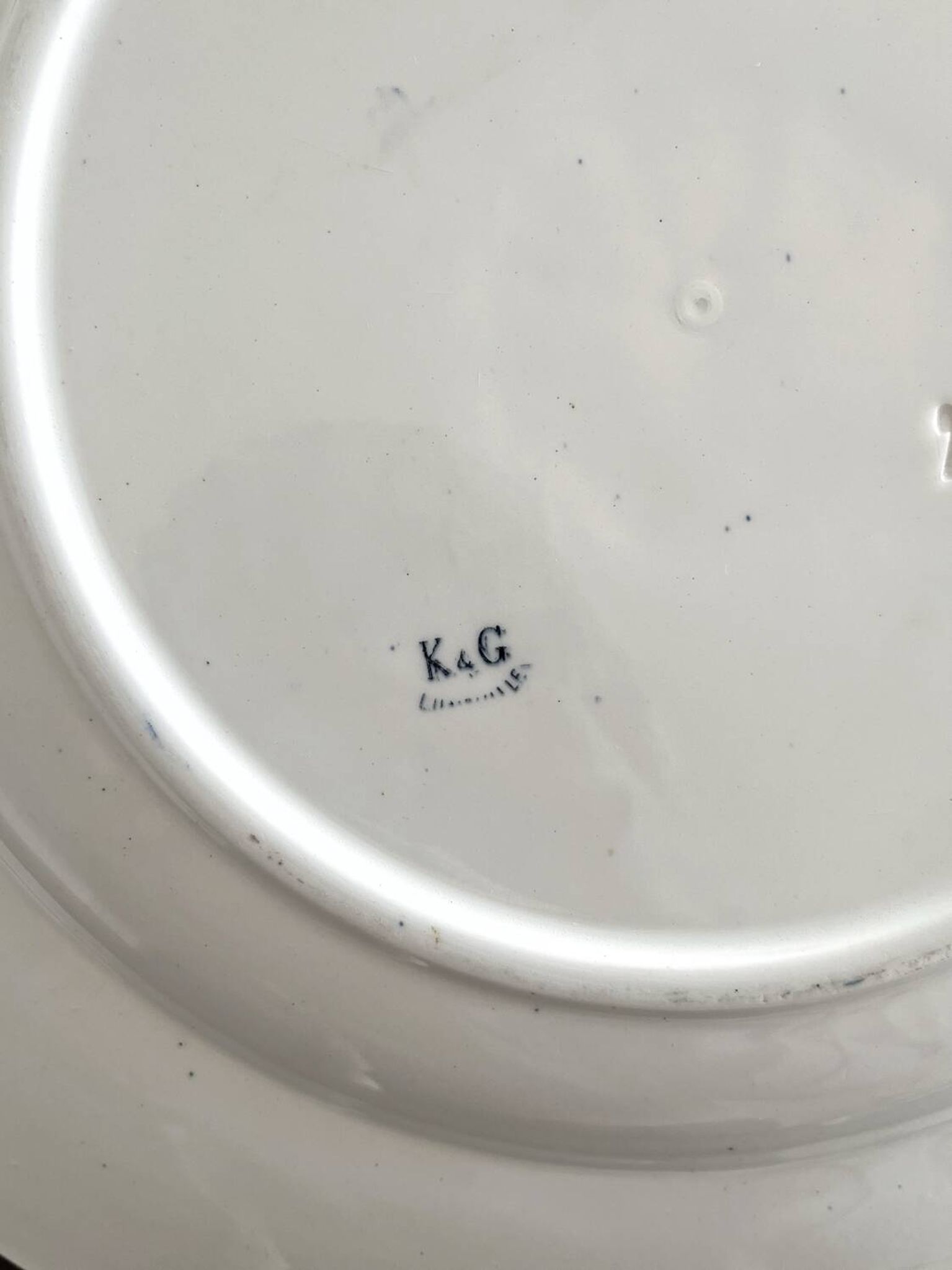 Round iron earth dish monogram “N” KG Lunéville