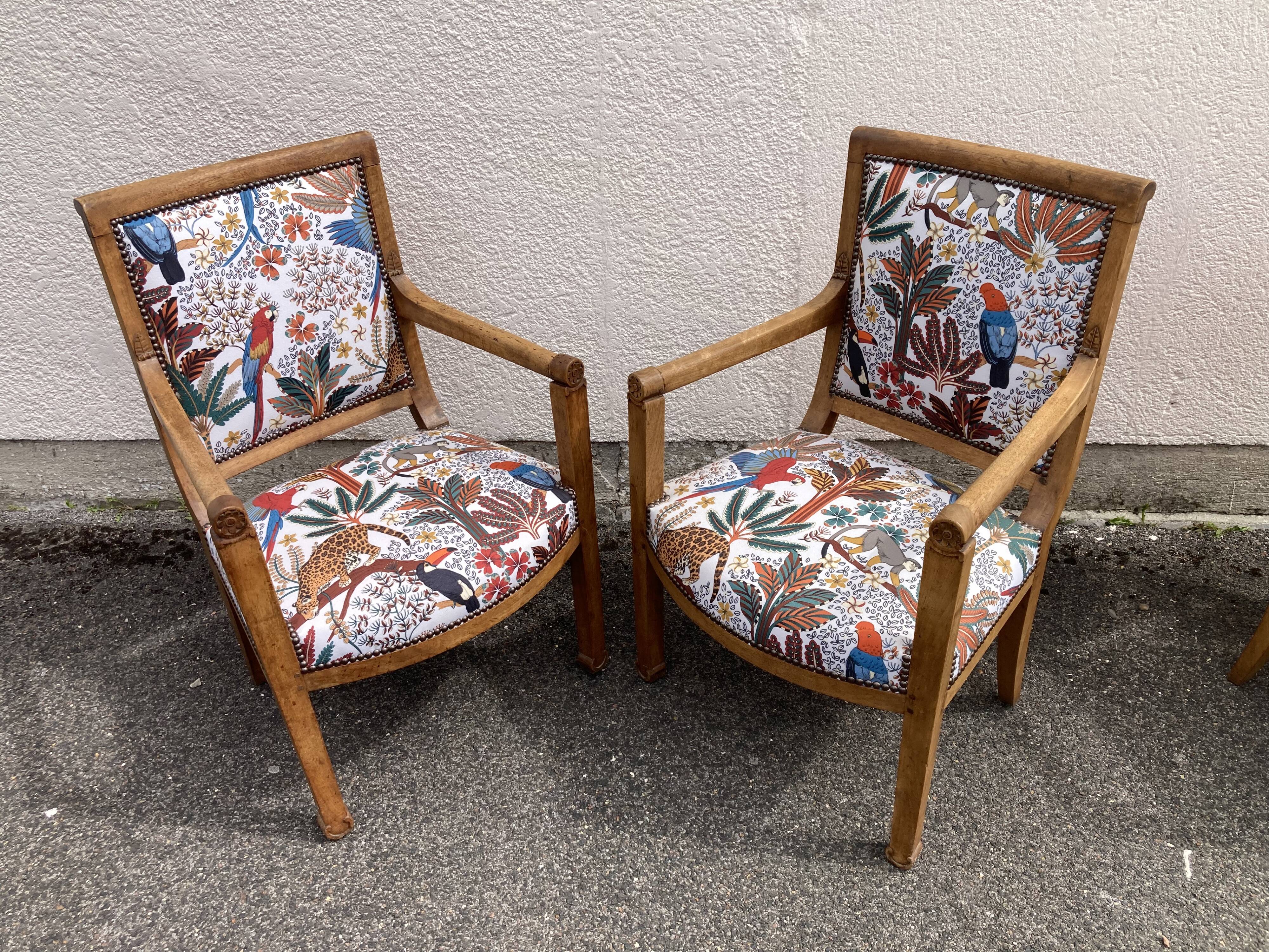 Set of four reupholstered Directoire period armchairs.