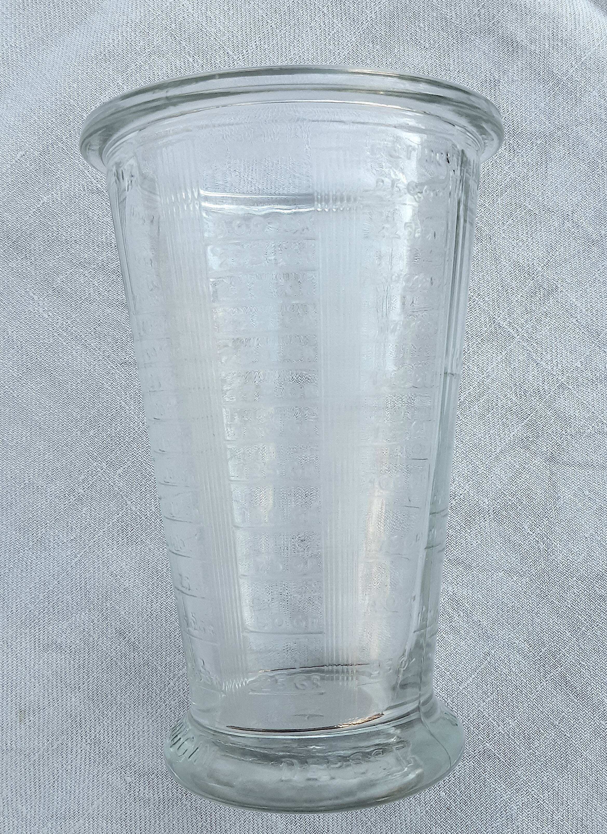 Graduated glass for weighing in the kitchen