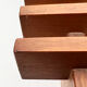 Teak bench designed by Inge and Luciano Rubino for APEC