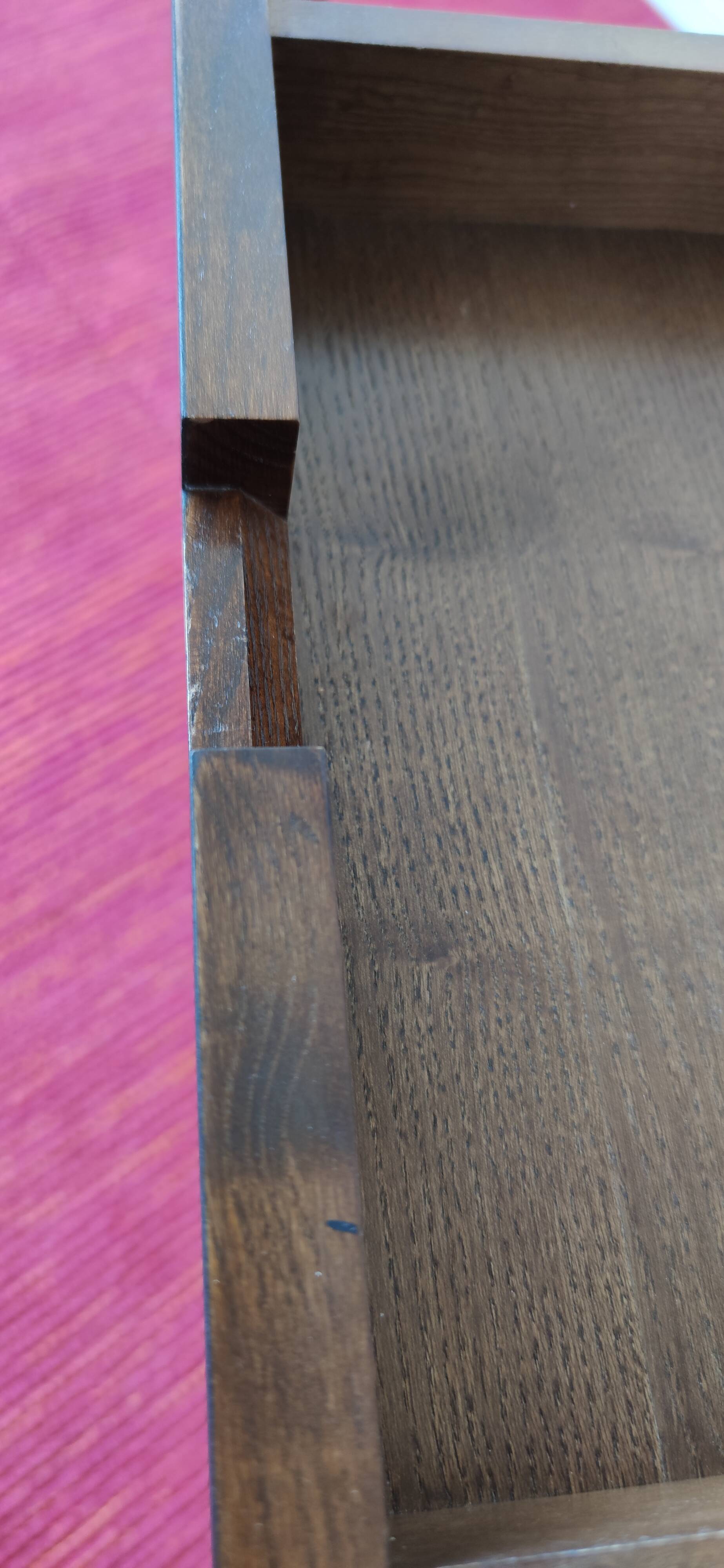 A pair of minimalist bedside tables