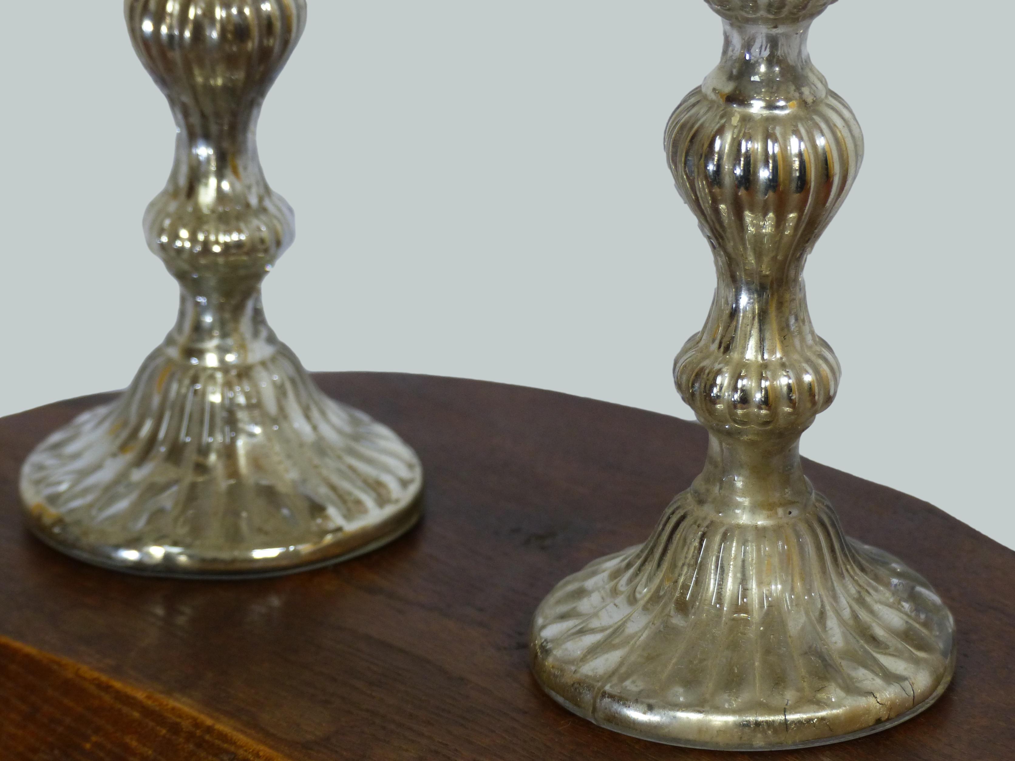 Pair of candle holders in eglomerized glass