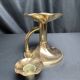 Brass candlestick in a fluted shape from the early 20th century.