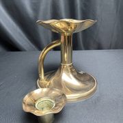 Brass candlestick in a fluted shape from the early 20th century.