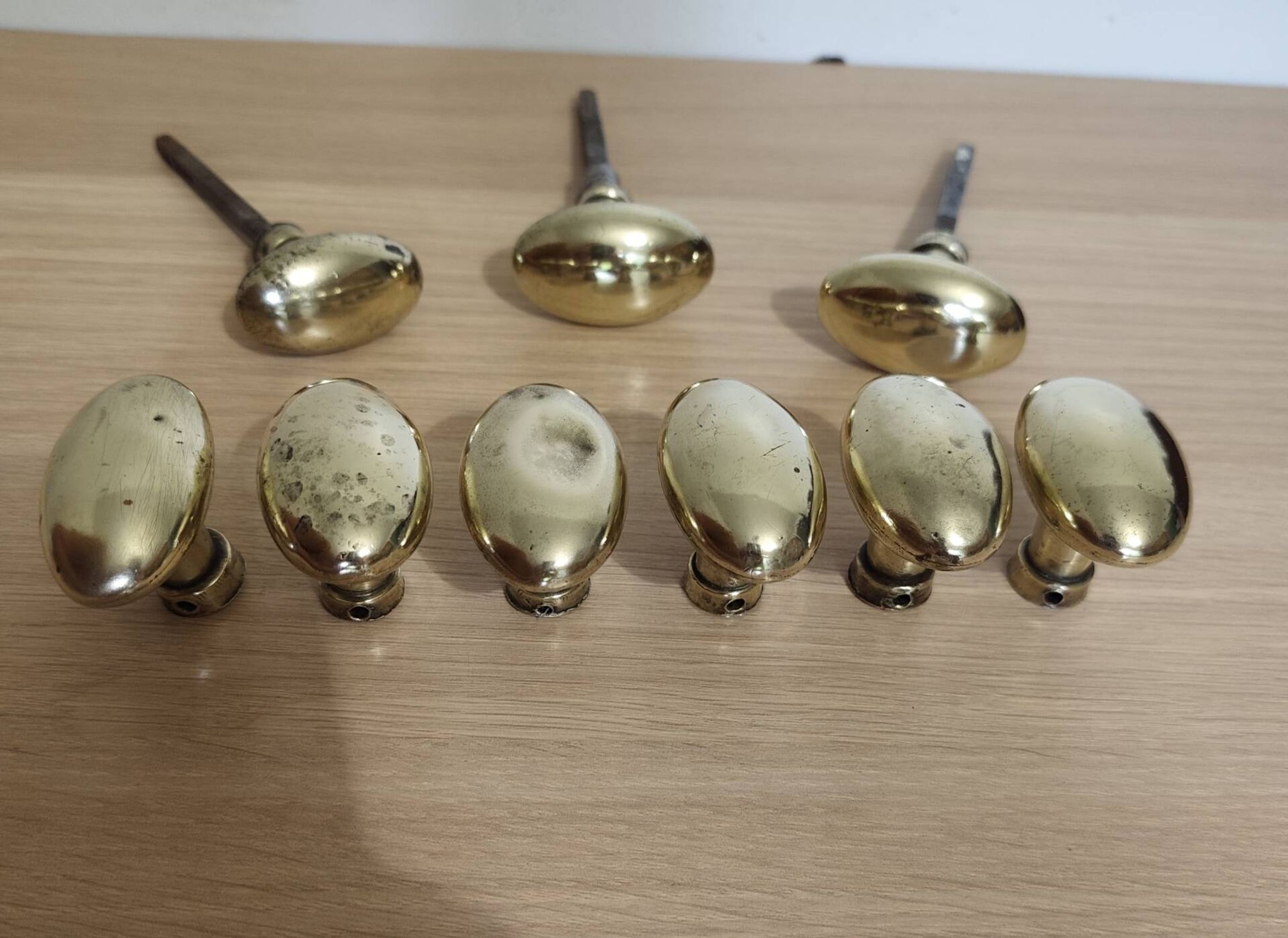Lot de 9 poignées de porte en laiton