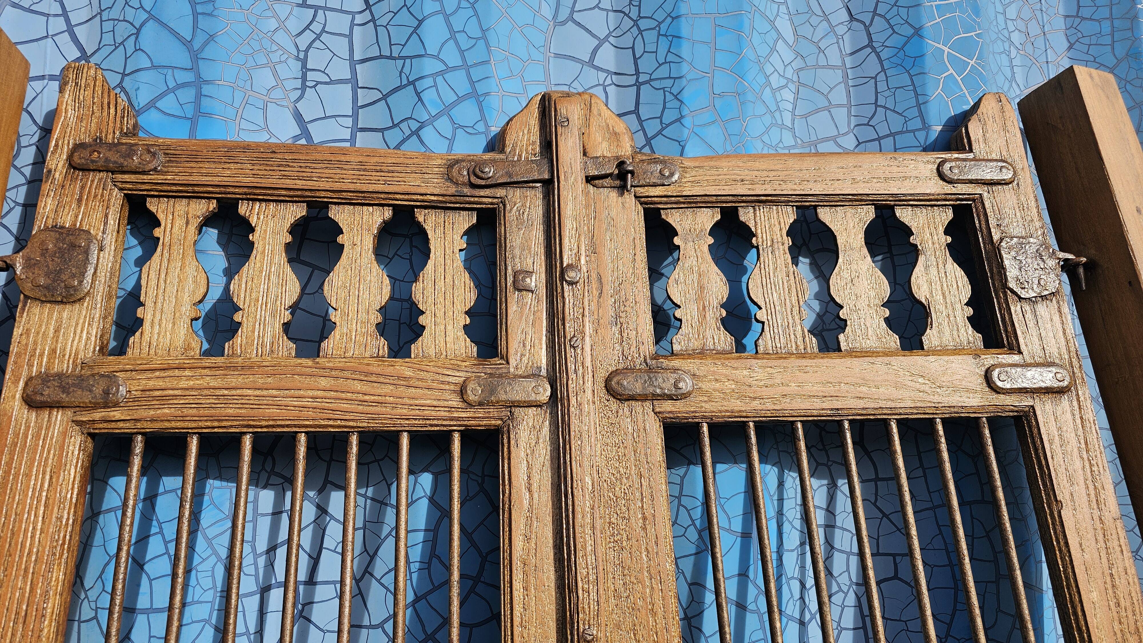 Old garden gate in solid teak