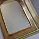 Set of three Moroccan brass mirrors in the form of arches, 43 cm