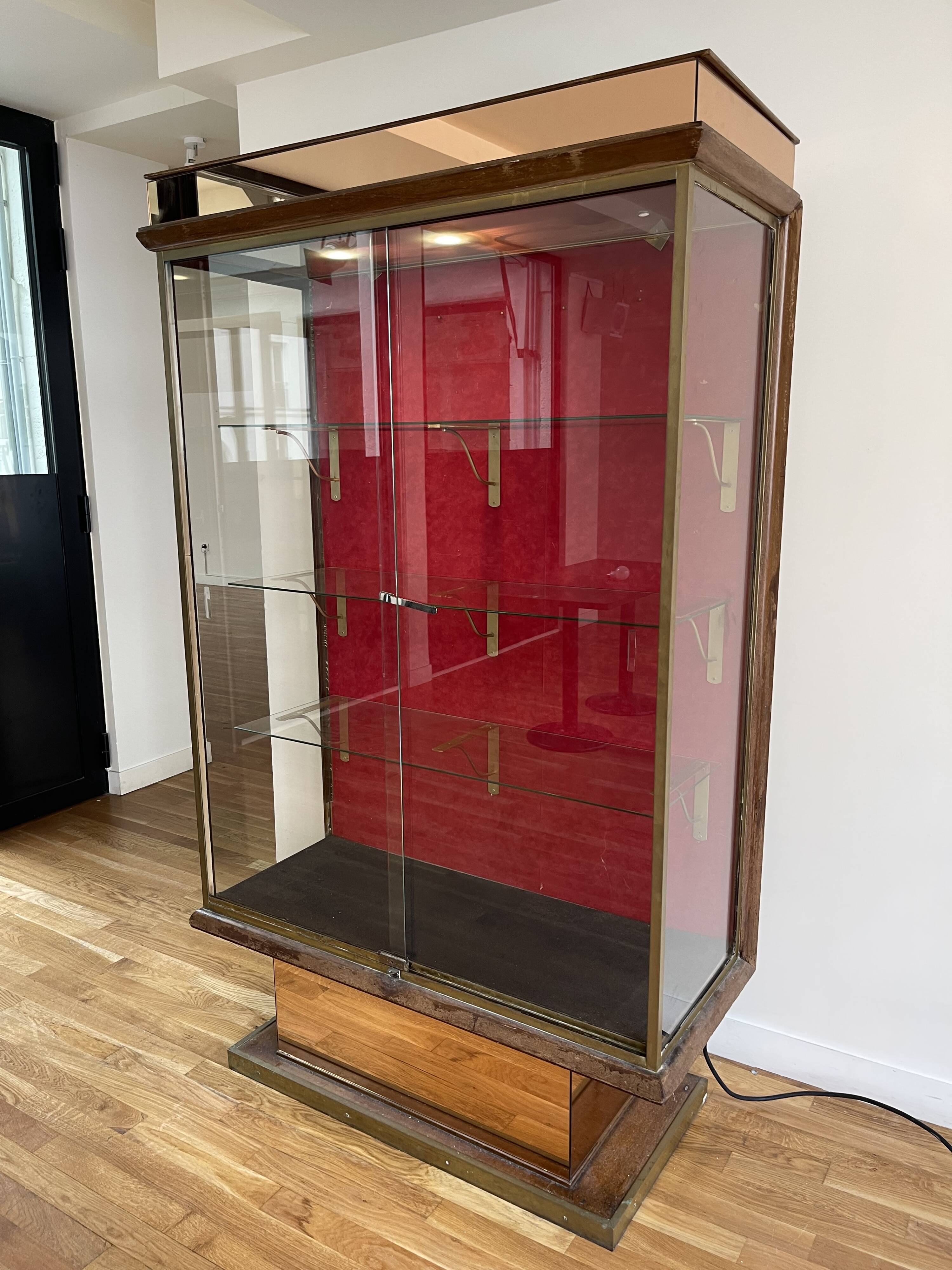 Brass display case from the Lutetia hotel with integrated lighting.