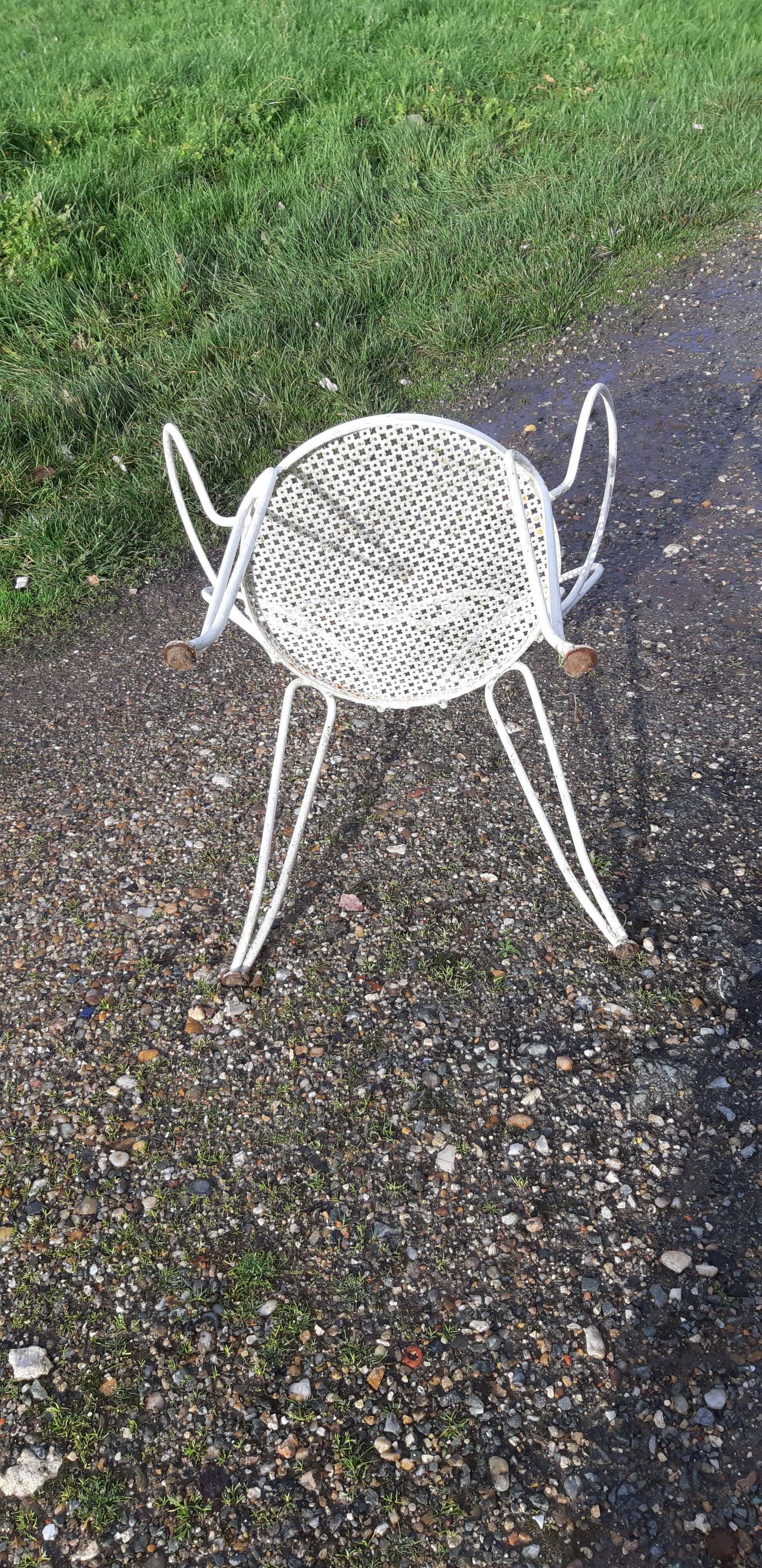 Paire de fauteuils de jardin 1900 en fer forgé