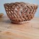 Braided wicker fruit basket
