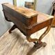 Empire period mahogany stepped desk with curule base circa 1810