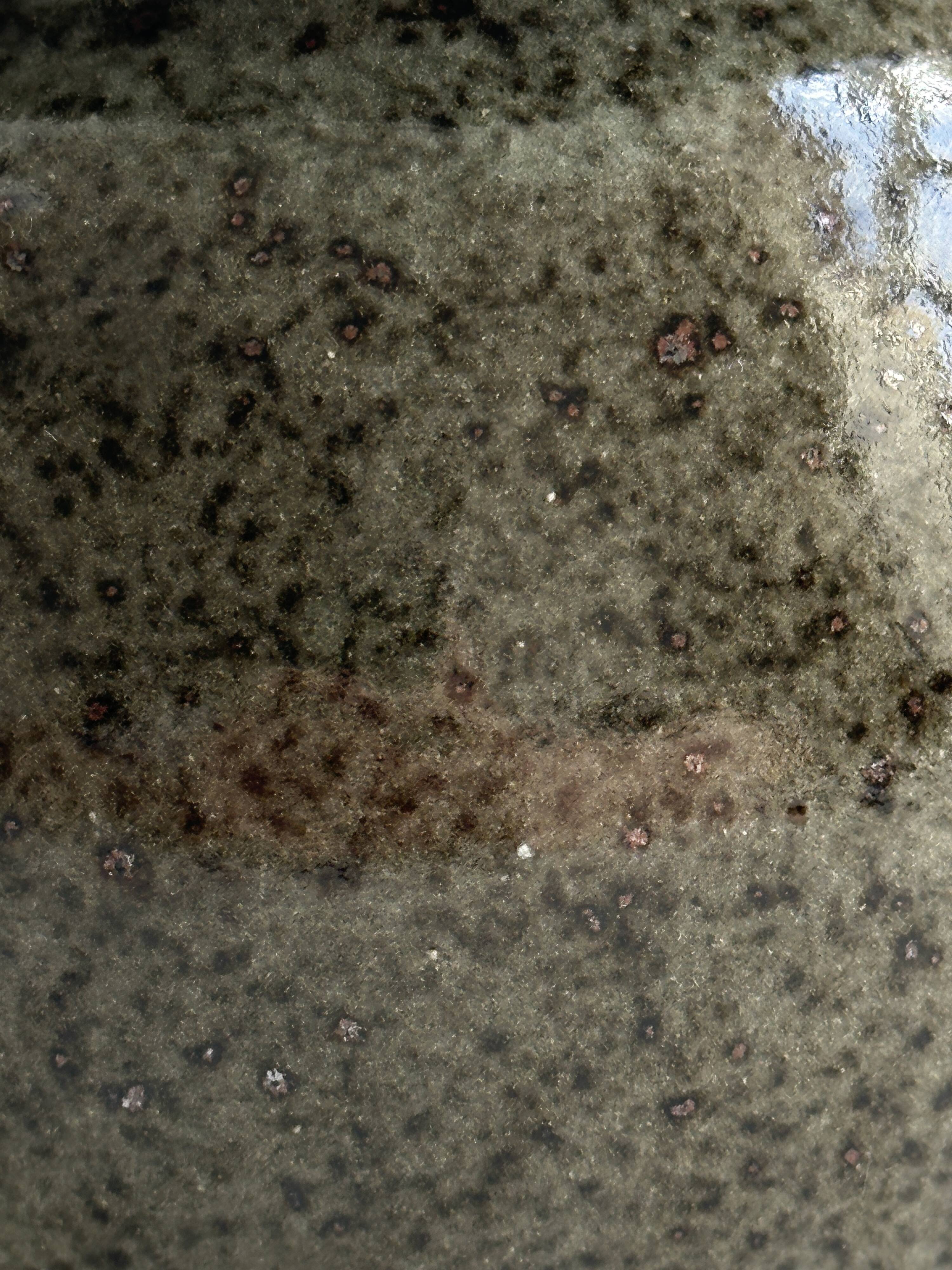 Vase - stoneware pot holder.