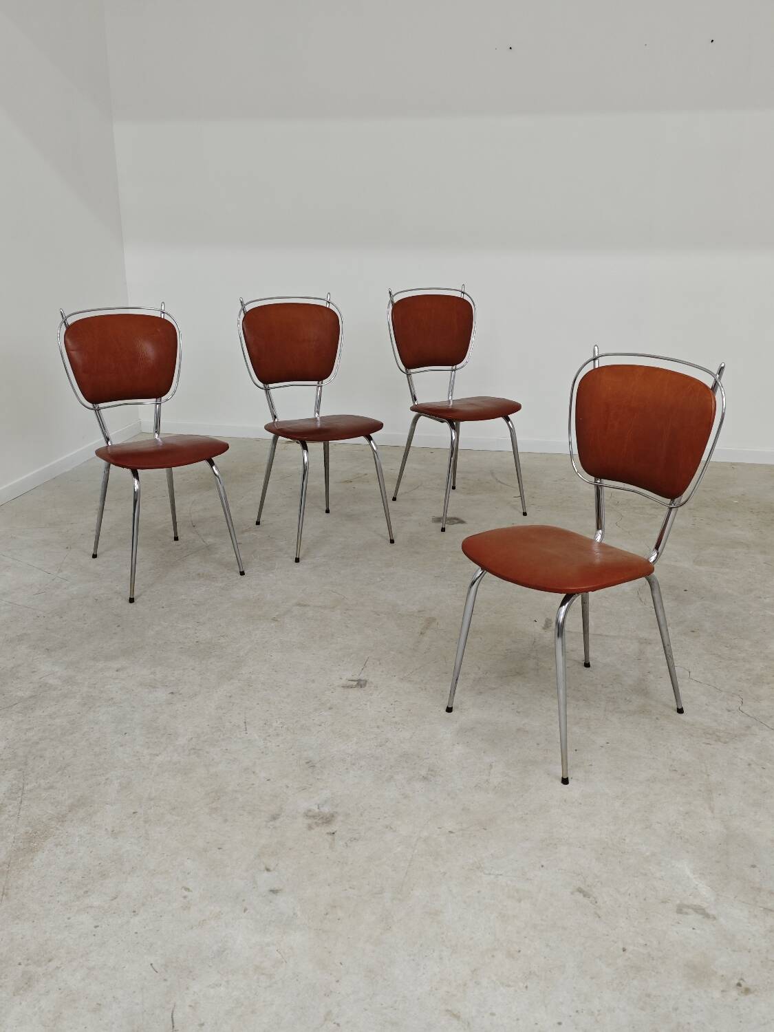 Set of 4 French chairs in camel brown imitation leather and chrome 1960