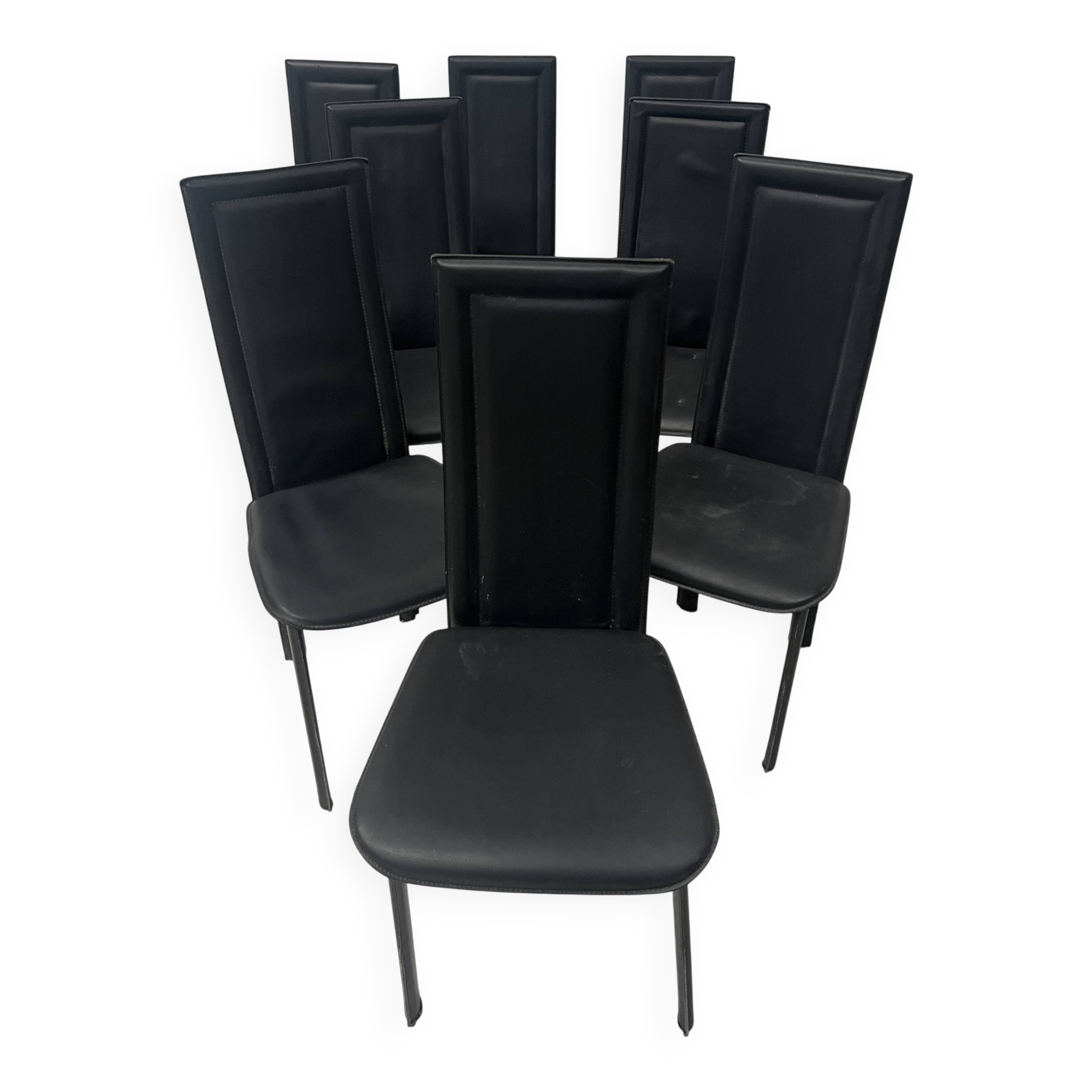 Set of eight designer chairs in black leather from the 20th century