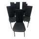 Set of eight designer chairs in black leather from the 20th century