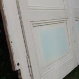Pair of cupboard doors and old woodwork frame