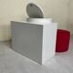Bathroom toilet with a 70s pouf.