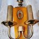 Antique pair of brass bakelite wall lights