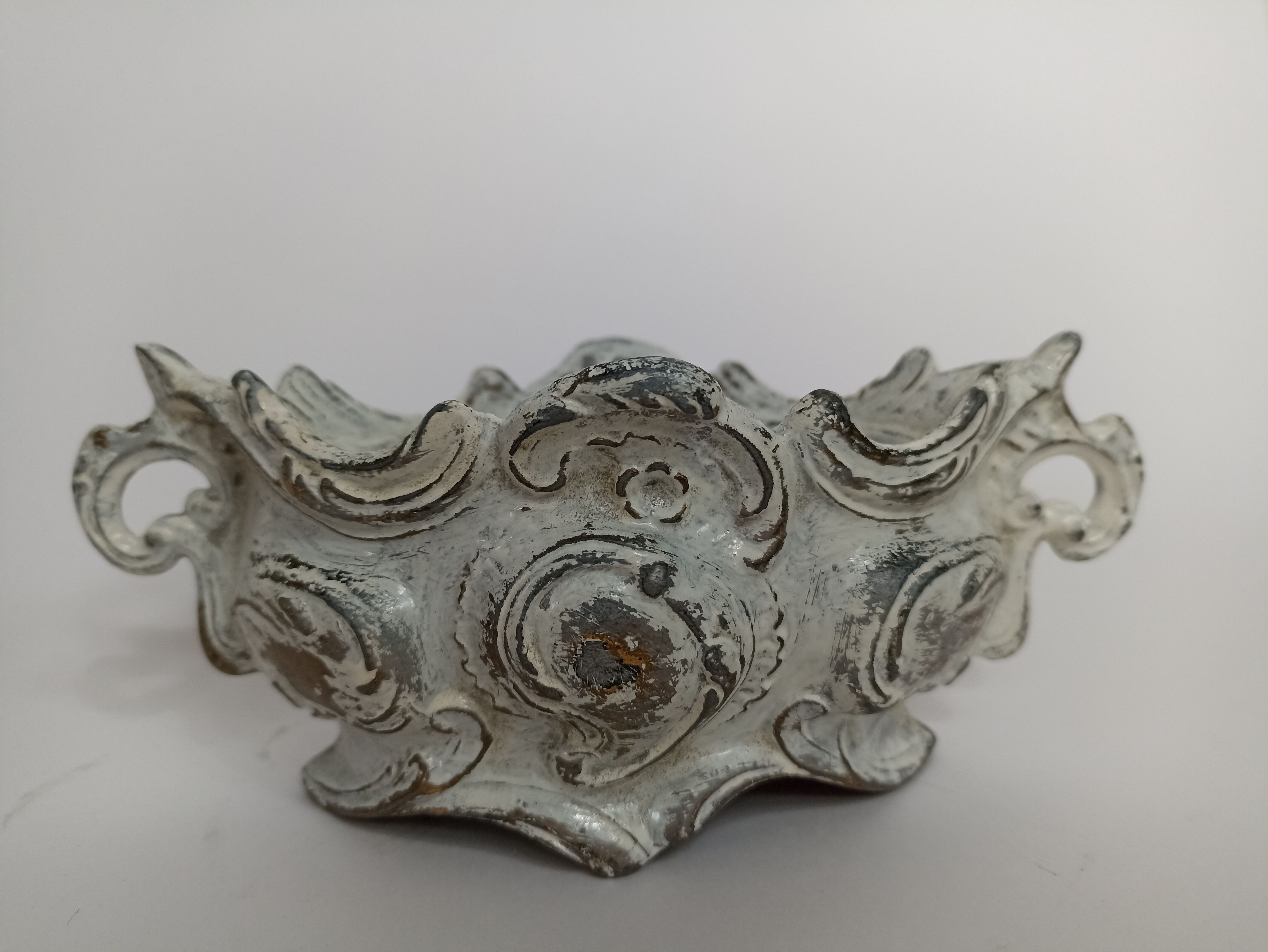 Old patinated cast iron planter