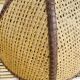 Bohemian suspension in braided raffia and brown fabric