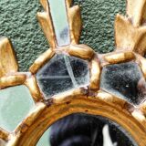 Sun mirror with parecloses, carved wood