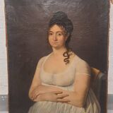 Portrait à l'huile d'une dame en robe blanche assise sur une tête de mort