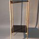 Pedestal table in patinated gilded brass faux foldable bamboo.