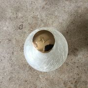 Cracked glass bottle