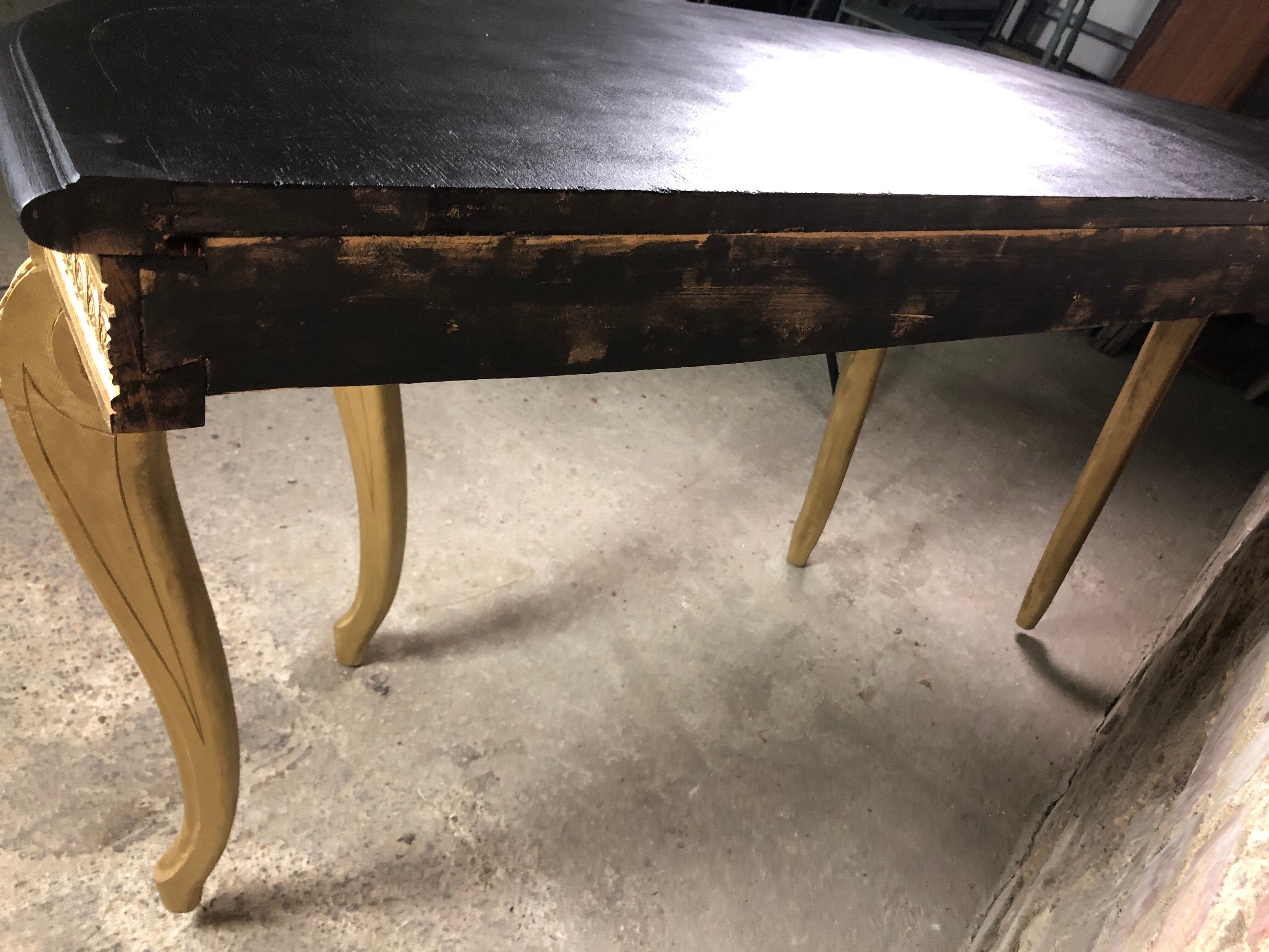Louis XV style console in carved wood with waxed black wood top