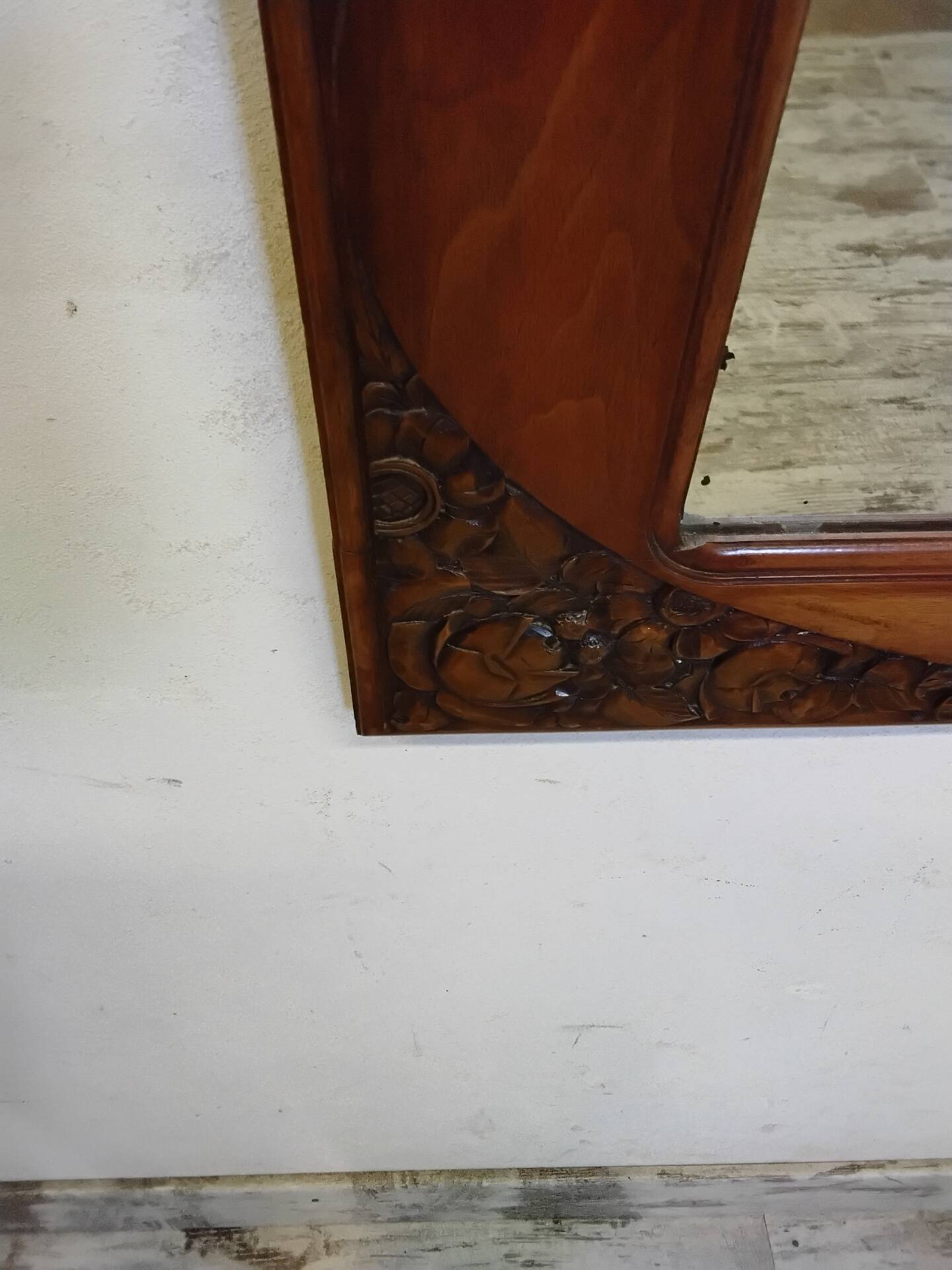 Art Deco mirror with a wooden frame