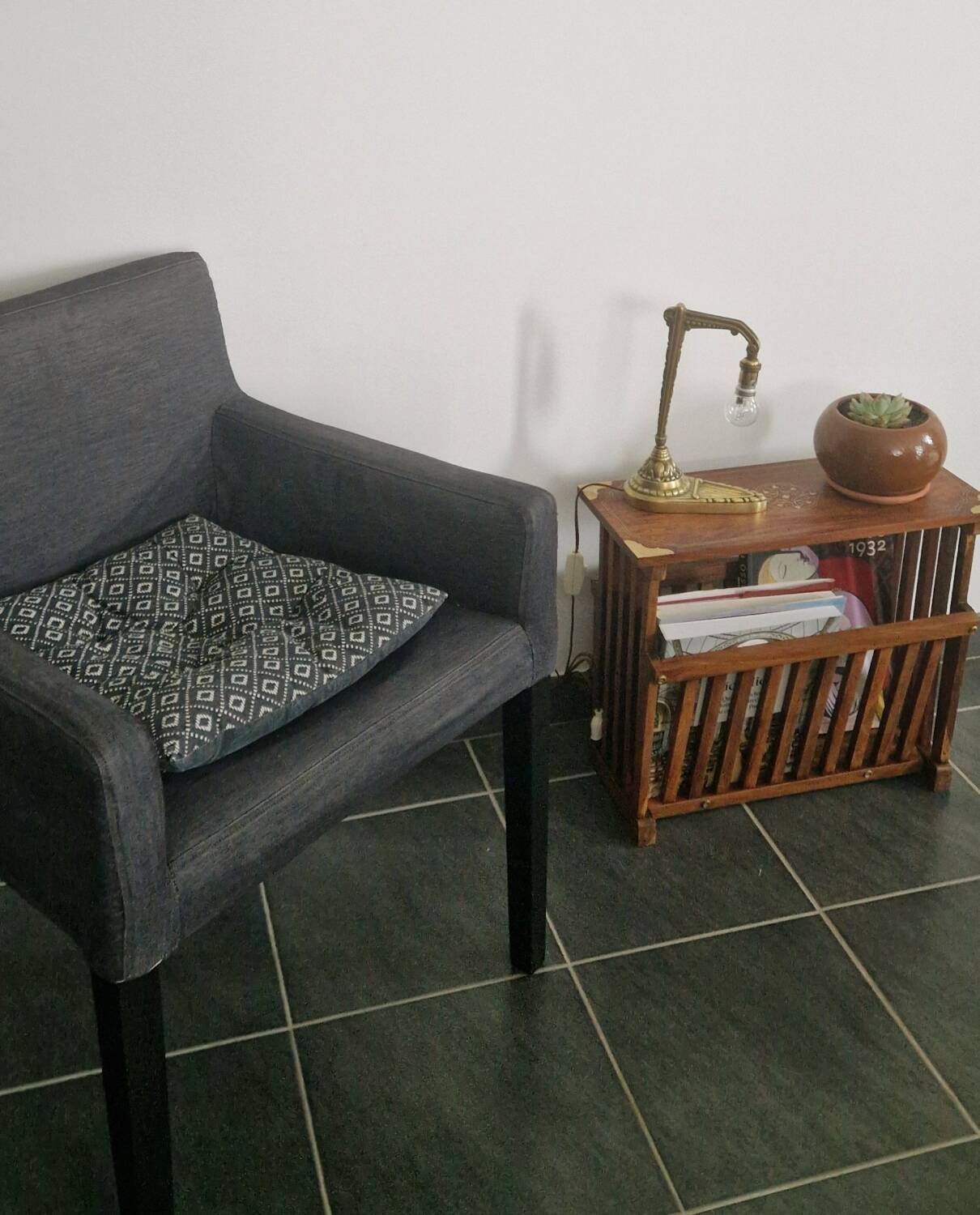 Rosewood and brass magazine stand table