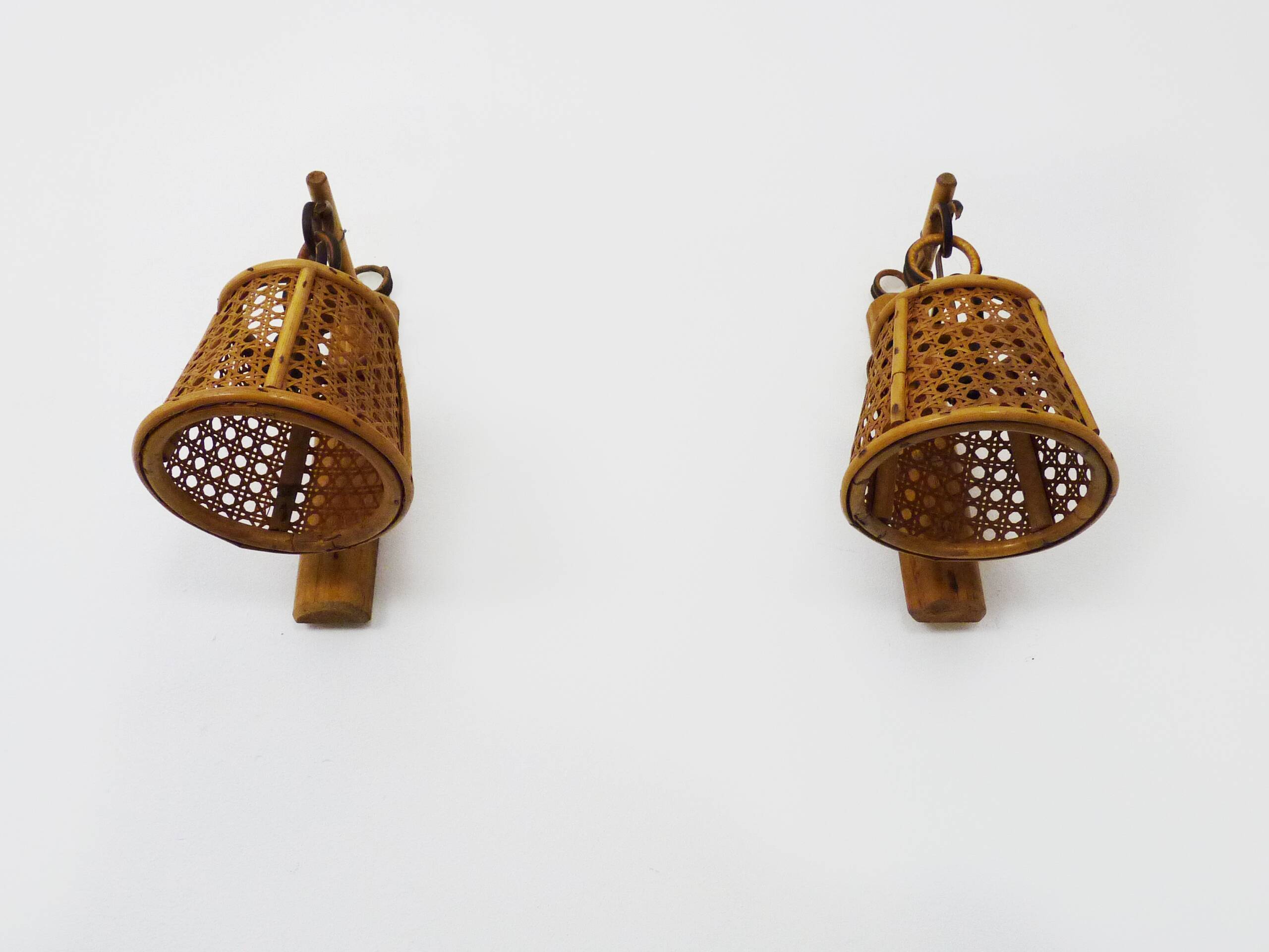 Pair of rattan and cane lantern wall lights. 1950s-60s