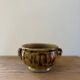 Vintage ceramic flowerpot with braided ears