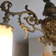 Antique Art Nouveau lustre in gilded bronze with glass pâte de verre tulips signed Muller.