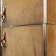 Pair of Guido Faleschini brown suede and metal wardrobes - 1960s
